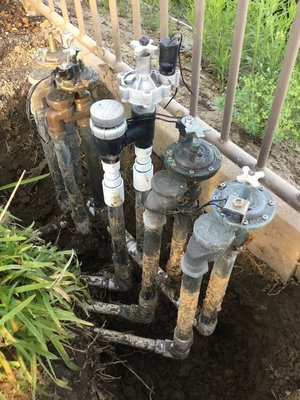 Valve Manifold Restoration Project - This irrigation system was in serious disrepair, with leaking, non-functional valves and disconnected wiring that left the controller unable to operate the final manifold. We fully restored the system by rebuilding each valve manifold using only high-quality materials. Additionally, we trenched and installed new conduit and sprinkler valve wiring for the last manifold. Another satisfied customer added to our list – we love taking on projects like this!
