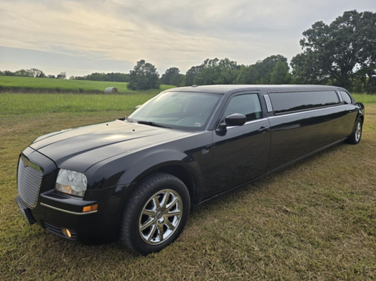 The Executive - Our Black Executive can hold up to 10 passengers. Experience unparalleled luxury and refinement with The Executive. Our Chrysler 300 limo awaits, ready to elevate any occasion. Check through our pictures for why you should choose the executive and then reach out to us via our website or call to talk about your ride! The Executive - Our Black Executive can hold up to 10 passengers. Experience unparalleled luxury and refinement with The Executive. Our Chrysler 300 limo awaits, ready to elevate any occasion. Check through our pictures for why you should choose the executive and then reach out to us via our website or call to talk about your ride!