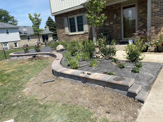 Hardscape disign patio - Landscape project with block garden wall
Unilock old quarry block with full nose cap
Planting design plants insatallation with weed fabric mulch installation Hardscape disign patio - Landscape project with block garden wall
Unilock old quarry block with full nose cap
Planting design plants insatallation with weed fabric mulch installation