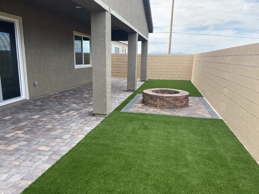 Desert Landscaping: Landscaping that Promotes Water Conservation - Our desert landscaping design not only offers aesthetic appeal but also practical benefits such as reduced upkeep and water usage. In the backyard, we installed pavers, turf, and a fire pit, effectively addressing any concerns with the HOA. We navigated the HOA guidelines and ensured the installation met all their requirements. To add a touch of nature, we planted an oleander tree in the front yard. The carefully selected paver colors beautifully harmonize with the house's hue, creating a visually stunning effect. The client was highly satisfied with the outcome. Desert Landscaping: Landscaping that Promotes Water Conservation - Our desert landscaping design not only offers aesthetic appeal but also practical benefits such as reduced upkeep and water usage. In the backyard, we installed pavers, turf, and a fire pit, effectively addressing any concerns with the HOA. We navigated the HOA guidelines and ensured the installation met all their requirements. To add a touch of nature, we planted an oleander tree in the front yard. The carefully selected paver colors beautifully harmonize with the house's hue, creating a visually stunning effect. The client was highly satisfied with the outcome.