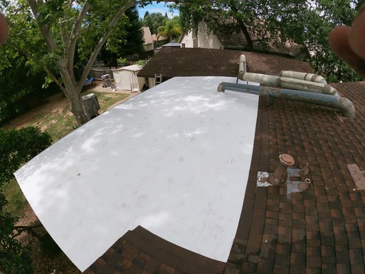 TPO Install 2022 - Removal of rolled comp and install of 60mil tpo, with comp tie in