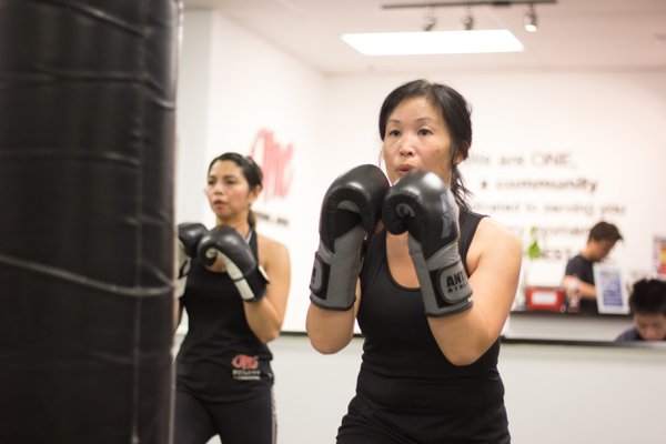 Fitness Kickboxing - Try a FREE class, we know you will love it!

Monthly plans and class cards to fit your needs.

Get ready to be empowered, optimize your health, and become the best version of yourself! Experience our Fitness Kickboxing program, where every class is designed to help you crush your goals and live your best life. Burn through calories, while having fun with a positive minded people. Our group-oriented approach will have you motivated and inspired every workout.