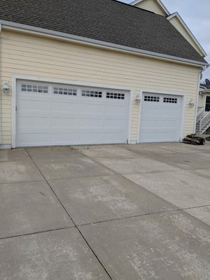 Oconomowoc High Lift - So many homes that are built these days have garage doors installed that don't make the most of the space that the garage has to offer. Upgrading the new doors that this customer chose to the high lift track option with high cycle springs and Liftmaster 8500w residential jackshaft operators, ensures the best utilization of space as well as a more open look and feel to the garage area.
If you have ever stared at all of the hanging metal in your garage with disgust and would like to see some options that would clean it up, give our door design team a call today! Oconomowoc High Lift - So many homes that are built these days have garage doors installed that don't make the most of the space that the garage has to offer. Upgrading the new doors that this customer chose to the high lift track option with high cycle springs and Liftmaster 8500w residential jackshaft operators, ensures the best utilization of space as well as a more open look and feel to the garage area.
If you have ever stared at all of the hanging metal in your garage with disgust and would like to see some options that would clean it up, give our door design team a call today!