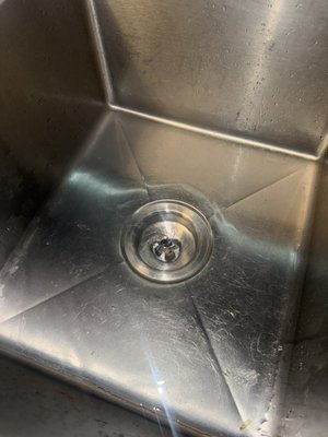 Emergency Kitchen Drain Repair – Modesto - Customer was experiencing a backed-up kitchen drain causing slow drainage and standing water. Hydroworks Plumbing performed a full drain unclogging service, cleared the blockage, and properly sealed the drain connection to restore normal flow and help prevent future leaks. The work area was cleaned after completion, and the system was tested to ensure proper drainage.