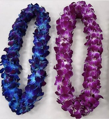 Graduation flowers and leis. - Graduation flowers.