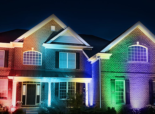 Color Changing Landscape Lights - Complete installation with 8 RGB coloring changing lights and a Kichler 200w transformer. Lights come on automatically at night with a light sensor at the transformer. The lights can be different colors, all the same color, or a classic warm white. The lights also have a fading effect which rotates through all the colors automatically. Color Changing Landscape Lights - Complete installation with 8 RGB coloring changing lights and a Kichler 200w transformer. Lights come on automatically at night with a light sensor at the transformer. The lights can be different colors, all the same color, or a classic warm white. The lights also have a fading effect which rotates through all the colors automatically.