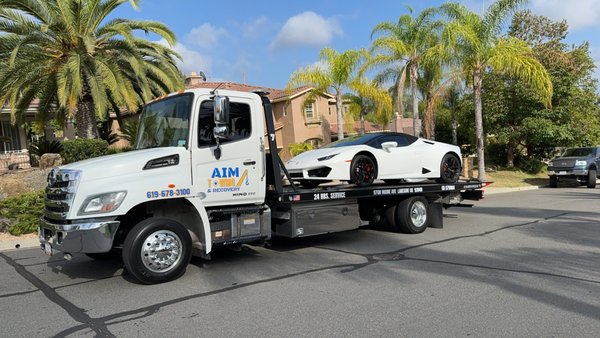 Flatbed Towing - When it comes to safe and efficient vehicle transport, our flatbed tow truck service has you covered! We specialize in hassle-free towing for all vehicle types—whether it's cars, motorcycles, or even luxury vehicles. With our state-of-the-art flatbed tow trucks, your vehicle is securely transported with no risk of damage. We're known for fast response times, competitive pricing, and professional service you can trust. Available 24/7, we're here to get you back on the road or safely transport your vehicle to your desired destination. Call us today for top-tier towing service!