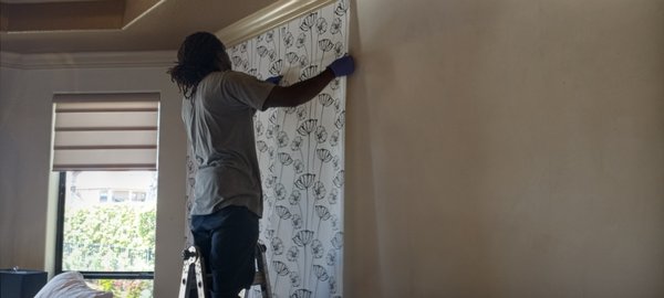 Installing new wallpaper to customer's bedroom wall - This was a project of removing old wallpaper and installing new wallpaper to a customer's bedroom wall. Installing new wallpaper to customer's bedroom wall - This was a project of removing old wallpaper and installing new wallpaper to a customer's bedroom wall.
