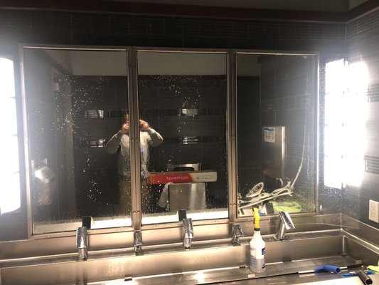 Our Mirror Graffiti Film - You may own a business, or were a customer in a public restroom and saw graffiti on the mirrors. It may drive away customers, and lessen the welcoming aesthetic. Our solution that we recommend for this is aint-graffiti film. Not only is this better investment than just replacing the mirror at those awfully high prices, but it also drives the artists to leave your mirrors alone!
When you think of graffiti, spray paint is probably what comes to mind. Unfortunately, taggers have evolved. Now they also use etching tools, acid, or even permanent markers.
LLumar® Anti-Graffiti Film is a way to fight back. It’s a nearly invisible layer of sacrificial film that protects against multiple types of tagging. We’ve engineered this film specifically to help protect smooth surfaces, such as glass and stainless steel. It’s durable, yet quick for professional installers to remove and replace. When they pull the film away, graffiti damage comes with it. And with installation of new film, your property is once again ready to make a good impression – and stand up to troublesome taggers.
You can have anti-graffiti film removed and re-installed many times over before it reaches the same cost as replacement of a single retail window. This makes it an excellent way to help prevent permanent damage to storefronts, public spaces, bathroom mirrors, elevator interiors and more. Our Mirror Graffiti Film - You may own a business, or were a customer in a public restroom and saw graffiti on the mirrors. It may drive away customers, and lessen the welcoming aesthetic. Our solution that we recommend for this is aint-graffiti film. Not only is this better investment than just replacing the mirror at those awfully high prices, but it also drives the artists to leave your mirrors alone!
When you think of graffiti, spray paint is probably what comes to mind. Unfortunately, taggers have evolved. Now they also use etching tools, acid, or even permanent markers.
LLumar® Anti-Graffiti Film is a way to fight back. It’s a nearly invisible layer of sacrificial film that protects against multiple types of tagging. We’ve engineered this film specifically to help protect smooth surfaces, such as glass and stainless steel. It’s durable, yet quick for professional installers to remove and replace. When they pull the film away, graffiti damage comes with it. And with installation of new film, your property is once again ready to make a good impression – and stand up to troublesome taggers.
You can have anti-graffiti film removed and re-installed many times over before it reaches the same cost as replacement of a single retail window. This makes it an excellent way to help prevent permanent damage to storefronts, public spaces, bathroom mirrors, elevator interiors and more.