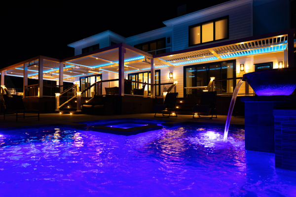 Ultimate Outdoor Oasis - Transforming the outdoor living area into a stunning oasis was our goal. We installed a multi-zone pergola system equipped with pivoting louvers, providing optimal shade and protection during the day. To enhance the evening experience, we integrated LED lights and heaters, creating a luxurious atmosphere for nighttime enjoyment.