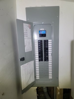 200 Amp Residential Electrical Service Upgrade - This house faced several electrical issues, including tripping breakers, overloaded circuits, and burnt outlets. To resolve these problems, we upgraded the home's main electrical service. We replaced all service components, including the service entrance conductors, meter, meter box, main panel, and weatherhead. The homeowner is thrilled with the new, safe installation and can now safely expand both his home and his electrical capacity. 200 Amp Residential Electrical Service Upgrade - This house faced several electrical issues, including tripping breakers, overloaded circuits, and burnt outlets. To resolve these problems, we upgraded the home's main electrical service. We replaced all service components, including the service entrance conductors, meter, meter box, main panel, and weatherhead. The homeowner is thrilled with the new, safe installation and can now safely expand both his home and his electrical capacity.