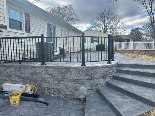 Patio--Textured, Colored Concrete with Steps - Customer in North Potomac, Maryland requested new patios (upper and lower) be constructed in back of the home. The appearance of natural slate color and texture is unique feature of these patios with the elegant and inviting stairs joining upper and lower areas. Bio Rich Green Care specializes in artistic designs in Concrete, which are also durable, functional and beautiful! Be in touch with us about your project--we provide a detailed estimate and tailor each patio for customer's requests. We also build retaining walls, driveways, walkways and anything in concrete, blocks or pavers with Landscape or lawn to match. Patio--Textured, Colored Concrete with Steps - Customer in North Potomac, Maryland requested new patios (upper and lower) be constructed in back of the home. The appearance of natural slate color and texture is unique feature of these patios with the elegant and inviting stairs joining upper and lower areas. Bio Rich Green Care specializes in artistic designs in Concrete, which are also durable, functional and beautiful! Be in touch with us about your project--we provide a detailed estimate and tailor each patio for customer's requests. We also build retaining walls, driveways, walkways and anything in concrete, blocks or pavers with Landscape or lawn to match.