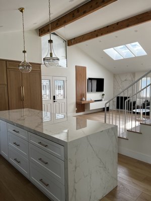 Whole-home remodel in Scripps Ranch - We took the inside of this Scripps Ranch house down to the studs, rebuilt the staircase and finished it with a waterfall-island kitchen, wide-plank floors, a slab fireplace wall and a slab-tiled bathroom. The first photos show the house before and during the work. Whole-home remodel in Scripps Ranch - We took the inside of this Scripps Ranch house down to the studs, rebuilt the staircase and finished it with a waterfall-island kitchen, wide-plank floors, a slab fireplace wall and a slab-tiled bathroom. The first photos show the house before and during the work.
