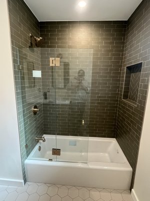 Bathroom renovation - This bathroom remodel transformed an outdated space into a clean, modern retreat. We removed the old fixtures and installed a new vanity, updated tile, fresh lighting, and shower to improve both style and function. The finished bathroom feels brighter, more spacious, and gives the home a fresh new look. Bathroom renovation - This bathroom remodel transformed an outdated space into a clean, modern retreat. We removed the old fixtures and installed a new vanity, updated tile, fresh lighting, and shower to improve both style and function. The finished bathroom feels brighter, more spacious, and gives the home a fresh new look.