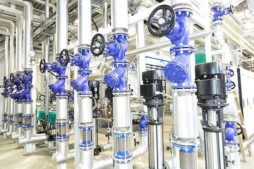City of Industry Water Plant - These are safety blue boiler room equipment shut off valves I did for heating system. Industrial pipelines, water pumps, valves, faucets new and clean.