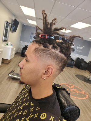 Men's Haircuts - We have a diverse team of barbers/stylists here to serve you. When you look good, you feel good! Men's Haircuts - We have a diverse team of barbers/stylists here to serve you. When you look good, you feel good!