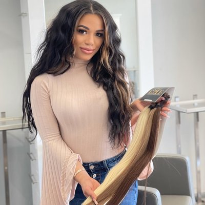 Champagne Hair Extensions - Call to book a detailed consultation for your hair extensions.