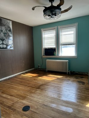 Floor Refinishing Project - Hardwood floor refinishing in a residential room — sanded, stained light, and finished with a high-gloss protective coat for a smooth, refreshed look. Floor Refinishing Project - Hardwood floor refinishing in a residential room — sanded, stained light, and finished with a high-gloss protective coat for a smooth, refreshed look.