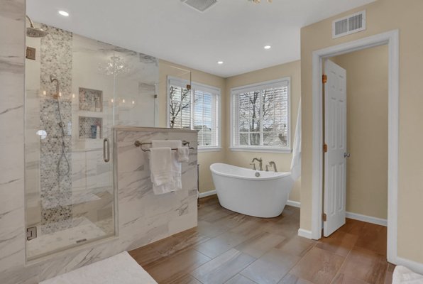 Timeless Master Bathroom Remodel in Tarzana, CA - Check out this recently completed timeless bathroom remodel by Build Trust Remodeling, where we transformed an outdated space into a sleek, spa-like retreat. Located right here in Tarzana, CA, this project features:
✔️ Custom tile installation with large-format porcelain
✔️ Frameless glass shower for an open, airy feel
✔️ Floating vanity with quartz countertop
✔️ LED mirror and recessed lighting for a modern glow
✔️ Matte black fixtures for a bold, elegant finish
✔️ Heated tile flooring for year-round comfort
We specialize in high-end bathroom remodeling, combining functionality with luxury finishes that promote healthier, more relaxing daily routines—all achieved with minimal disruption and at competitive prices that ensure you get superior results without overpaying. Whether you’re looking to update a small guest bathroom or a full master suite, our team delivers clean, modern designs with precision and care, empowering you to enjoy a space that exceeds expectations and boosts your home's value effortlessly. Services include: Custom Tile Installation, Frameless Shower Enclosure, Vanity and Countertop Upgrades, Lighting Design, Fixture Installation, Heated Flooring, and Layout Optimization. Timeless Master Bathroom Remodel in Tarzana, CA - Check out this recently completed timeless bathroom remodel by Build Trust Remodeling, where we transformed an outdated space into a sleek, spa-like retreat. Located right here in Tarzana, CA, this project features:
✔️ Custom tile installation with large-format porcelain
✔️ Frameless glass shower for an open, airy feel
✔️ Floating vanity with quartz countertop
✔️ LED mirror and recessed lighting for a modern glow
✔️ Matte black fixtures for a bold, elegant finish
✔️ Heated tile flooring for year-round comfort
We specialize in high-end bathroom remodeling, combining functionality with luxury finishes that promote healthier, more relaxing daily routines—all achieved with minimal disruption and at competitive prices that ensure you get superior results without overpaying. Whether you’re looking to update a small guest bathroom or a full master suite, our team delivers clean, modern designs with precision and care, empowering you to enjoy a space that exceeds expectations and boosts your home's value effortlessly. Services include: Custom Tile Installation, Frameless Shower Enclosure, Vanity and Countertop Upgrades, Lighting Design, Fixture Installation, Heated Flooring, and Layout Optimization.