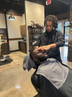 Zae, the Barber - Zae, is a wiz with all types of hair. He is loves cutting hair and it shows but he loves a good conversation. Zae, the Barber - Zae, is a wiz with all types of hair. He is loves cutting hair and it shows but he loves a good conversation.