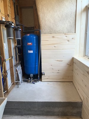 Combi Boiler Installation - This was installed in a client's straw bale home, located west of Boulder, CO in the foothills. A few years back we installed in-slab radiant heating tubing and we returned to install a triangle tube PEA110 Combi Boiler. This is a combination tankless water heater and boiler in one. It not only heats the water for the home but also provides heating for the radiant tubing we had previously installed. The homeowner is able to comfortably heat his home - and fill his bathtub or take a shower with the same equipment. The Combi Boiler is extremely efficient! For this weekend getaway home, it's perfect for sustaining temperatures when the homeowners are away and keeps them comfortable when they are back to visit. Combi Boiler Installation - This was installed in a client's straw bale home, located west of Boulder, CO in the foothills. A few years back we installed in-slab radiant heating tubing and we returned to install a triangle tube PEA110 Combi Boiler. This is a combination tankless water heater and boiler in one. It not only heats the water for the home but also provides heating for the radiant tubing we had previously installed. The homeowner is able to comfortably heat his home - and fill his bathtub or take a shower with the same equipment. The Combi Boiler is extremely efficient! For this weekend getaway home, it's perfect for sustaining temperatures when the homeowners are away and keeps them comfortable when they are back to visit.