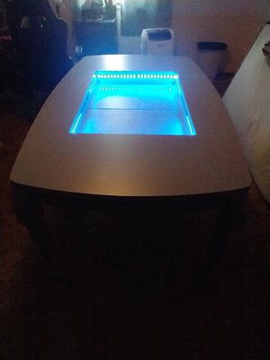 Custom Built Gaming Table 2022 - This table was custom built. Customer requested that it fit a 24 X 36 inch play mat inside the lowered play area. Painted Grey with a polyurethane clear coat and built in LED lights. Custom Built Gaming Table 2022 - This table was custom built. Customer requested that it fit a 24 X 36 inch play mat inside the lowered play area. Painted Grey with a polyurethane clear coat and built in LED lights.