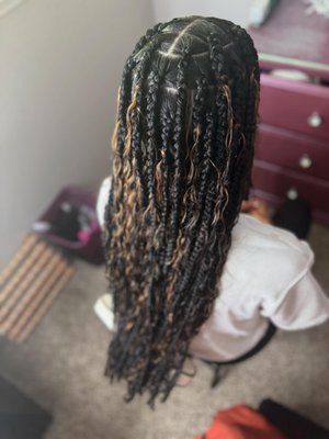 Knotless Braids - Knotless Box Braids is an increasingly popular style for women of all ages. 
Options range between classic knotless, or goddess, mermaid, boho, etc. 
This style can be worn for 1-2 months, depending on commitment to aftercare.
