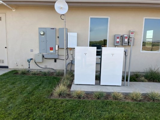 Tesla Powerwall & Home Battery Storage | Certified Installation - Blackout-proof your home with the industry's most reliable backup technology. As a Tesla Powerwall Certified Installer, we specialize in home battery backup solutions designed to keep your lights, fridge, and AC running when the grid fails.

We take the stress out of the process with a complete full-service installation. Our in-house team handles everything: precision load calculations, city permitting, electrical panel upgrades, and custom concrete pads.

Being based in the Central Valley, we are experts in PG&E and SCE grid integration, ensuring your system is optimized for both emergency backup and daily energy savings. Plus, with no subcontractors, we personally own your project from the first wire to the final inspection. Don't get left in the dark—experience true energy independence!