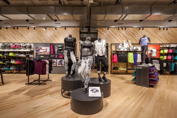 Nike Store - The Grove - 31,000 Sqft - The Grove is a large open mall that includes many large retailers like Nordstrom, Apple, Sandro, and more. The multi-level Nike store located in this mall is known for its incredible design and use of natural hardwood in flooring, walls, and seating. Nike Store - The Grove - 31,000 Sqft - The Grove is a large open mall that includes many large retailers like Nordstrom, Apple, Sandro, and more. The multi-level Nike store located in this mall is known for its incredible design and use of natural hardwood in flooring, walls, and seating.