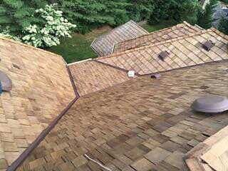 Cedar shake roof replacement in Potomac MD - We replaced the old wood shakes on this Potomac home with new CCA Medium cedar shakes. We install a lot of roofs in this particular community (Avenel) and worked closely with the HOA in order to ensure that the new roof met the architectural guide lines of the community. Cedar shake roof replacement in Potomac MD - We replaced the old wood shakes on this Potomac home with new CCA Medium cedar shakes. We install a lot of roofs in this particular community (Avenel) and worked closely with the HOA in order to ensure that the new roof met the architectural guide lines of the community.