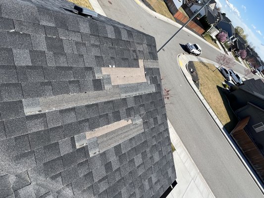 Shingle Roof Repair - Seamlessly replaced missing shingles.