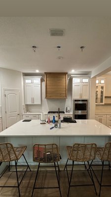 Remodel - We did a transformation on this kitchen, updated quartz, cabinets, range hood and engineered flooring. Remodel - We did a transformation on this kitchen, updated quartz, cabinets, range hood and engineered flooring.