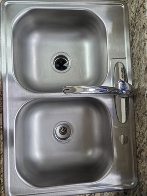 kitchen sink. - This is my monthly clients sink that I cleaned using Bar keepers friend.