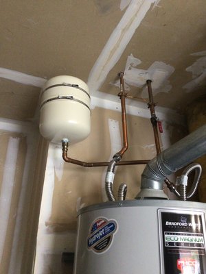 Water heater repair - Water heater had an expansion tank leaking into the garage. We also noticed the recirculating pump was burnt out. Quick swap, no more leak and instant hot water again! Water heater repair - Water heater had an expansion tank leaking into the garage. We also noticed the recirculating pump was burnt out. Quick swap, no more leak and instant hot water again!