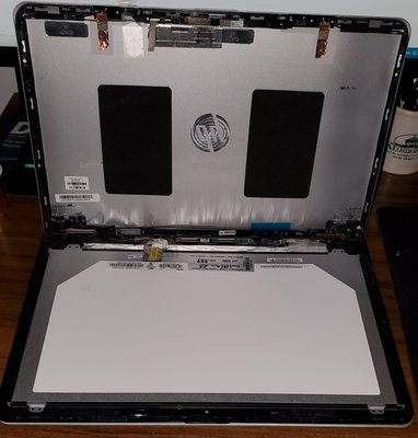 HP Envy x360 LCD Replacement - These four pictures show the repair about mid-way through the process. Transferring the good pieces from the old lid to the new one, making