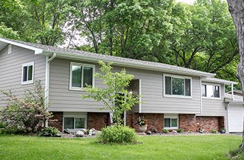 Vinyl Siding - Apple Exteriors provides vinyl siding replacement and installation services in the Twin Cities area, where siding is one of the most important investments in your home. Let us enhance your home’s value, curb appeal, energy efficiency, and protection with the highest quality vinyl siding services in the industry!

Modern vinyl siding comes in an impressive array of styles, colors, and patterns. When you pick Apple Exteriors for your siding installation, we’ll show you a wide range of materials so we can both get a sense of your preferences. Together, we’ll select the best siding for your home and budget. And when the work is done, you’ll have beautiful, long-lasting siding that enhances your property in every way.