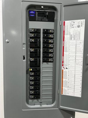 Panel Upgrade - A panel upgrade refers to replacing or enhancing an existing electrical service panel (also known as a breaker box or distribution board) to improve the system's safety, capacity, and efficiency.
This is typically done when:
The current panel is outdated or unsafe (e.g. fuse-based or undersized),
Additional electrical load is needed (e.g. for renovations, new appliances, EV chargers, HVAC systems),
There are signs of wear, tripping breakers, or overheating.
Key components of a panel upgrade may include:
Installing a new breaker panel with higher amperage (e.g. upgrading from 100A to 200A),
Replacing old breakers and circuits,
Ensuring proper grounding and bonding,
Updating wiring to meet modern electrical codes,
Adding surge protection or smart monitoring features.
Benefits:
Increases electrical capacity for modern usage,
Reduces risk of fire or electrical failure,
Brings the system up to current safety codes,
Prepares the home for future upgrades like solar panels or electric vehicles. Panel Upgrade - A panel upgrade refers to replacing or enhancing an existing electrical service panel (also known as a breaker box or distribution board) to improve the system's safety, capacity, and efficiency.
This is typically done when:
The current panel is outdated or unsafe (e.g. fuse-based or undersized),
Additional electrical load is needed (e.g. for renovations, new appliances, EV chargers, HVAC systems),
There are signs of wear, tripping breakers, or overheating.
Key components of a panel upgrade may include:
Installing a new breaker panel with higher amperage (e.g. upgrading from 100A to 200A),
Replacing old breakers and circuits,
Ensuring proper grounding and bonding,
Updating wiring to meet modern electrical codes,
Adding surge protection or smart monitoring features.
Benefits:
Increases electrical capacity for modern usage,
Reduces risk of fire or electrical failure,
Brings the system up to current safety codes,
Prepares the home for future upgrades like solar panels or electric vehicles.