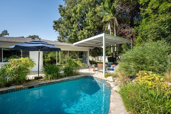 Adjustable Patio Cover in Scripps Ranch - We upgraded our client's old and deteriorating patio cover into a brand new state of the art cover. The new patio cover has a custom heater, fan, and adjustable cover that can open up.