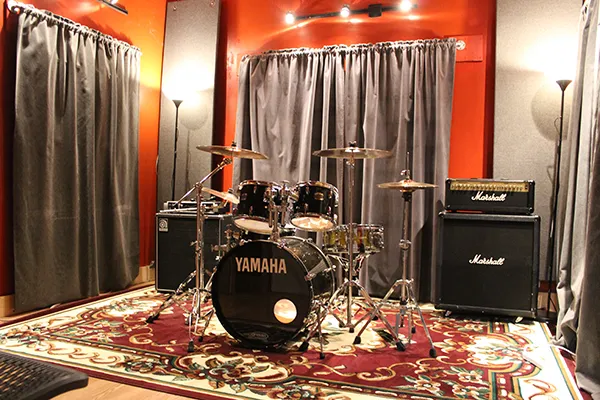 Rehearsal Rooms Available - 562-464-9456 - Experience Top-Tier Rehearsal Space at Loaded Bomb Studios in Santa Fe Springs

Our Santa Fe Springs location is a spacious 3,000 sq ft facility, featuring six fully equipped rehearsal rooms. Conveniently located equidistant to Hollywood, Orange County, and Long Beach, we are the ideal choice for musicians throughout the region. We are open seven days a week with easy load-in and plenty of parking available.

Explore each room by clicking on the photos to see detailed room and gear information. In addition to our rehearsal spaces, we offer on-site amp and guitar repair, as well as a well-stocked music store carrying strings, sticks, cymbals, and other accessories.

Booking Details:

2-Hour Minimum: Required for all room bookings.
Rehearsal Hours:
Monday – Friday: 4:00 PM – 1:00 AM
Saturday & Sunday: 12:00 PM – 12:00 AM
Earlier or later hours can be arranged by appointment (additional fees may apply).
We prioritize cleanliness and safety, ensuring all rooms are cleaned and disinfected daily. Join us at Loaded Bomb Studios and elevate your rehearsal experience!