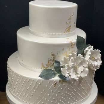 Fondant Wedding Cakes - Order your dream fondant wedding cake from Sugar Butter Flour. Our team of expert bakers and designers work closely with you to create a stunning, custom cake that reflects your style and tastes—perfectly tailored for your special day. Fondant Wedding Cakes - Order your dream fondant wedding cake from Sugar Butter Flour. Our team of expert bakers and designers work closely with you to create a stunning, custom cake that reflects your style and tastes—perfectly tailored for your special day.