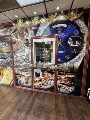 We Buy Your Gold! - Jewelry store that also buys gold, silver, and diamond coins, and offers watch repairs. We Buy Your Gold! - Jewelry store that also buys gold, silver, and diamond coins, and offers watch repairs.
