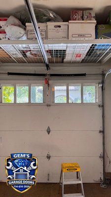 Wood garage door broken spring 
Same day repair - Same day wood garage door repair , one huge spring custom size for two residential springs 
Weighed door 270 lbs and got correct springs off truck and installed for customer , cool process for perfect balance doors even if they’re super heavy !