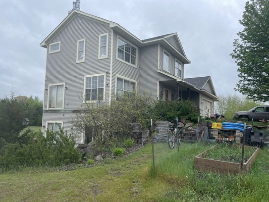Exterior Renovation in Big Lake, MN - This home in Big Lake, MN received an exterior overhaul courtesy of Sela Gutter Connection. The roof was replaced with Driftwood TruDefinition Duration shingles from Owens Corning and new Montana Suede Mastic siding was installed. The windows and doors were replaced with brand new ones from Provia and new gutters were also added to this home. Exterior Renovation in Big Lake, MN - This home in Big Lake, MN received an exterior overhaul courtesy of Sela Gutter Connection. The roof was replaced with Driftwood TruDefinition Duration shingles from Owens Corning and new Montana Suede Mastic siding was installed. The windows and doors were replaced with brand new ones from Provia and new gutters were also added to this home.