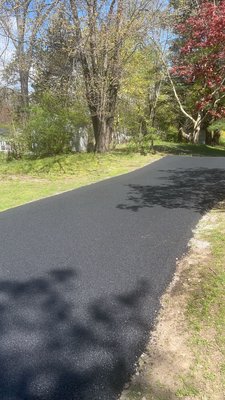 Driveway installation! - JW Smith Paving's process begins with thorough site evaluation and preparation, ensuring a solid foundation. We then apply a carefully selected base, followed by high-quality asphalt paving. Our skilled team compacts the surface for maximum durability. Finally, we meticulously inspect and seal the new driveway, guaranteeing a smooth, long-lasting finish.