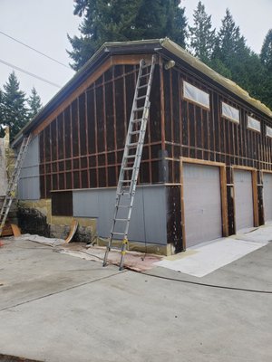exterior painting in bothell - this home was stained with a oil based stain. We had to oil primer the entire home so the the top coat would adhere to the siding. This is a good example of why it's good hire a professional this paint job will last for years because the prep was done correctly.