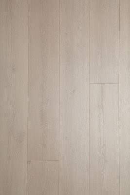 Waterproof  Performance Laminate - 100 % Water resistant child & pet safe laminate flooring. Core: Innovated High Density  Aqua Fiberboard. 9" X 72" Extra Long Planks, 12mm Overall thickness.