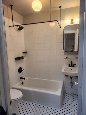 Low budget bathroom in Park slope in Brooklyn. - This is a low budget bathroom that I needed to replace The bathroom tiles showerhead and the thermostate Include the vanity and amira un installing beautiful Curtain bar. Low budget bathroom in Park slope in Brooklyn. - This is a low budget bathroom that I needed to replace The bathroom tiles showerhead and the thermostate Include the vanity and amira un installing beautiful Curtain bar.