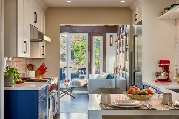 McLaren Park Home - Jenni and Jesse, a youthful couple hailing from San Francisco, embarked on their kitchen redesign project with us in September 2017. Under the guidance of Catrina, our design lead, we collaborated with our esteemed vendors to orchestrate a seamless execution of their vision.

The initial remodel proved to be an outstanding success, showcasing a remarkable transformation that underscored the dedication and diligent efforts invested in the project.

Fast-forwarding two years, our clients extended an invitation for Catrina to revisit their property and reimagine the lower level. Originally housing a compact office, bathroom, laundry, and storage area, this space presented an opportunity for a contemporary overhaul. This endeavor allowed us to significantly enhance this integral part of their residence, culminating in the creation of a lavish primary suite complete with a cozy fireplace and an expansive, indulgent primary bathroom.

Shortly after completing the demolition phase, the onset of the COVID-19 pandemic presented unprecedented challenges. The commendable commitment of both the clients and the general contractor played a pivotal role in navigating these trying times, ensuring the project adhered to its schedule.

Earlier this year, Jenni and Jesse enlisted LOCZI for another creative venture. This time, the focus was on revitalizing their guest bathroom, crafting a bespoke bar for entertaining guests, and refreshing the beloved "Tahoe Room."

The guest bathroom's whimsical tile pattern holds a special place in Catrina’s heart as one of her favorite designs.

Over the past seven years, our journey alongside Jenni and Jesse has been truly extraordinary. Their trust holds immense significance for us, and we deeply cherish it. We sincerely aspire to explore another opportunity to contribute to the transformation of the remaining spaces in their home. (wink wink) It would be an absolute privilege to continue our collaboration and contribute to the ongoing evolution of their residence.

Project Year: 2023
Project Cost: $200,001 - $500,000