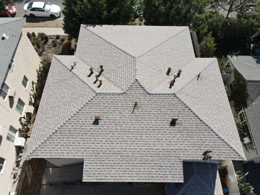 Complete Asphalt Shingle Roof Replacement - This project involved a full residential asphalt shingle roof replacement in Los Angeles, CA. The existing roofing system was completely removed down to the roof deck to allow for a thorough inspection and proper preparation prior to installing the new materials.
Our team evaluated the condition of the roof deck, addressed necessary repairs, and prepared the surface to ensure structural integrity. High-quality underlayment was installed to enhance waterproofing, followed by the installation of new asphalt shingles with precise alignment, clean valleys, and professionally finished ridge caps.
The completed roof provides improved durability, weather resistance, and a clean, uniform appearance. This project reflects CoStar Roofing Inc’s commitment to craftsmanship, attention to detail, and long-lasting roofing solutions designed for Southern California homes. Complete Asphalt Shingle Roof Replacement - This project involved a full residential asphalt shingle roof replacement in Los Angeles, CA. The existing roofing system was completely removed down to the roof deck to allow for a thorough inspection and proper preparation prior to installing the new materials.
Our team evaluated the condition of the roof deck, addressed necessary repairs, and prepared the surface to ensure structural integrity. High-quality underlayment was installed to enhance waterproofing, followed by the installation of new asphalt shingles with precise alignment, clean valleys, and professionally finished ridge caps.
The completed roof provides improved durability, weather resistance, and a clean, uniform appearance. This project reflects CoStar Roofing Inc’s commitment to craftsmanship, attention to detail, and long-lasting roofing solutions designed for Southern California homes.