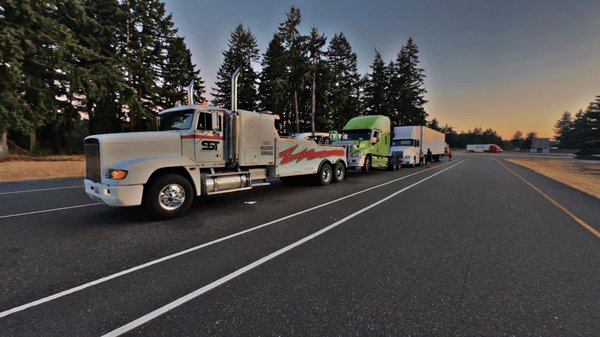 Semi Truck/Trailer towing! - Silverline Towing & Transport: Your Trusted Towing Partner in Lewis County
Stuck on the Road? We're Here to Help!

At Silverline Towing & Transport, we understand that vehicle breakdowns and roadside emergencies can happen anytime, anywhere. With over 12 years of experience, our team of experts is dedicated to providing reliable and efficient towing and transport services to the Lewis County community and beyond.

Our Services:

Short Distance Towing: Need a quick tow? Our team is ready to assist you with short-distance towing to your desired location.
Long Distance Towing: We provide secure and efficient long-distance towing services to get your vehicle where it needs to be.
Flatbed Towing: Our flatbed towing service ensures your vehicle is transported safely and without any damage.
Recreational Vehicle Towing: Trust us to tow your RVs and other recreational vehicles with the utmost care.
Winch Outs: Stuck in a ditch or off-road? Our winch-out service will get you back on track in no time.
Full-Service Roadside Assistance: From jump-starts to tire changes, we've got you covered with comprehensive roadside assistance.
Why Choose Silverline Towing & Transport?

Experience You Can Trust: With over a decade of experience, we’ve seen it all and can handle any towing or roadside situation.
Large Fleet, Quick Response: Our team boasts 11 vehicles, including our sister company’s fleet, ensuring quick and efficient service.
Competitive Pricing: We offer top-notch services at prices that won’t break the bank.
24/7 Emergency Services: Day or night, rain or shine, we are available 24 hours to assist you in any emergency.
When you choose Silverline Towing & Transport, you're choosing reliability, professionalism, and peace of mind. Don’t let a vehicle mishap ruin your day – call us anytime for swift and dependable service!

Contact Us Today!

📞 Phone: [Insert Phone Number]
🌐 Website: [Insert Website URL]
📍 Location: Serving Lewis County and the surrounding areas

Silverline Towing & Transport – We’re Just a Call Away!